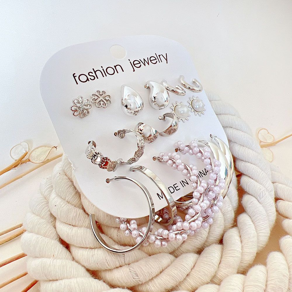 گوشواره پک 9 عددی  اشکی نقره ای