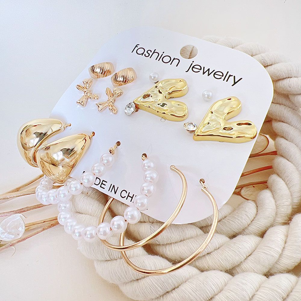 گوشواره پک 8 عددی قلب و پاپیون طلایی