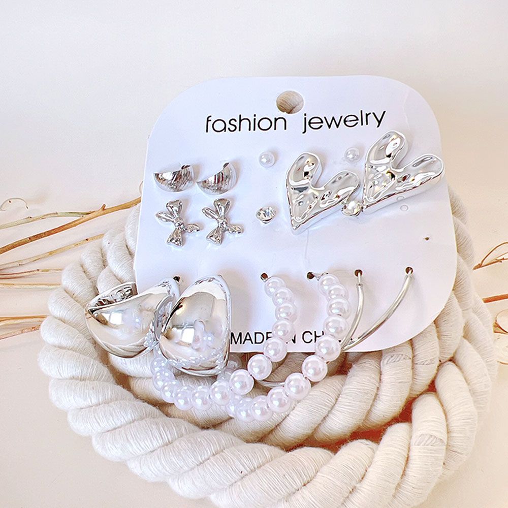 گوشواره پک 8 عددی قلب و پاپیون نقره ای