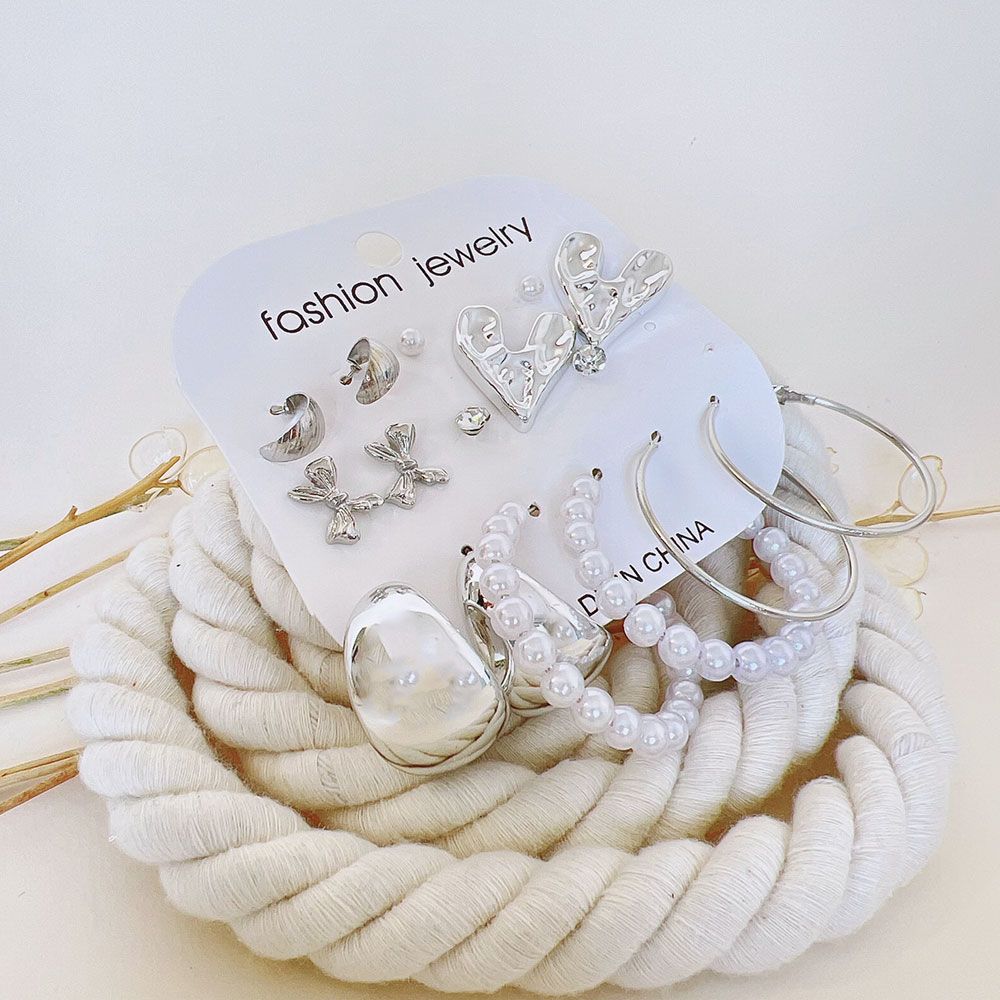 گوشواره پک 8 عددی قلب و پاپیون نقره ای