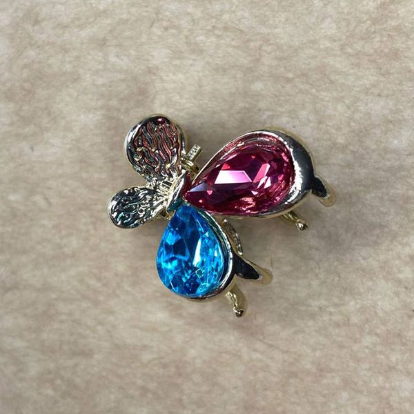 گل سر کوچک نگین دار کریستالی قرمز و آبی 