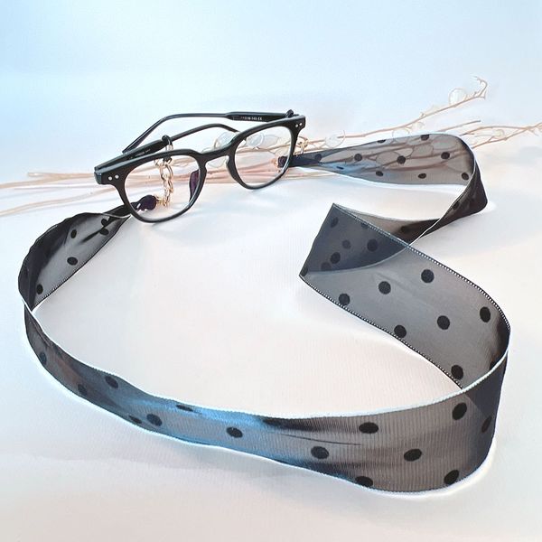 بند عینک خالدار مشکی دور سفید 