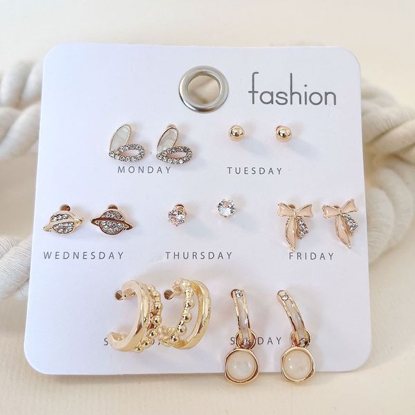 پک گوشواره 7 تایی قلب و پاپیون طلایی 