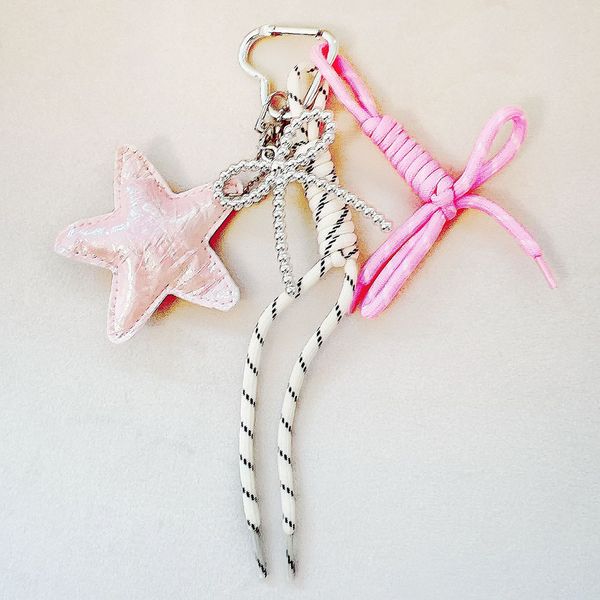 چارم بگ پاپیون با ستاره صورتی