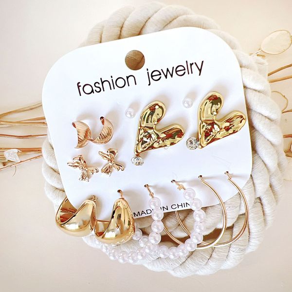 گوشواره پک 8 عددی قلب و پاپیون طلایی