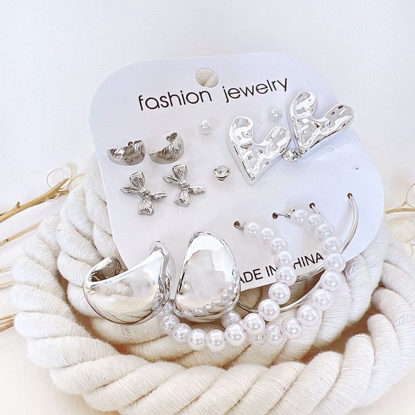 گوشواره پک 8 عددی قلب و پاپیون نقره ای