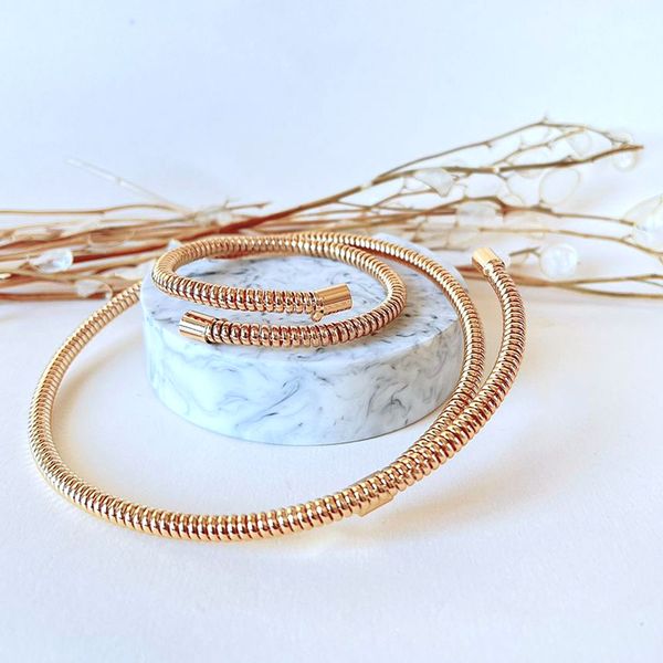 ست بنگل و گردنبند فنری طلایی 