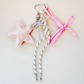 چارم بگ پاپیون با ستاره صورتی